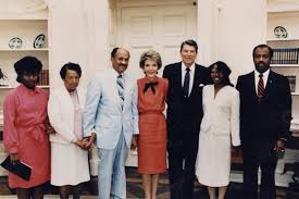 Eugene Allen and his family posing with President Reagan